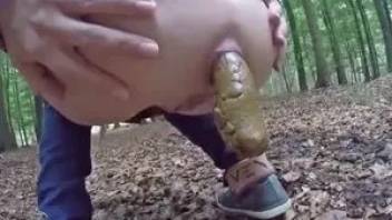 Amateur video pooping girl on nature 3