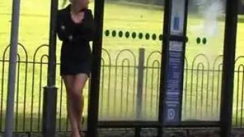 Little girl pee at a bus stop