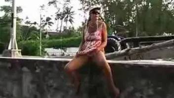 Woman pissing in town