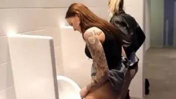 Two girls shitting and pissing in the men's room