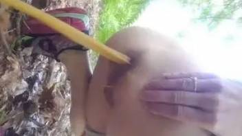 Girl powerfully poops into the woods