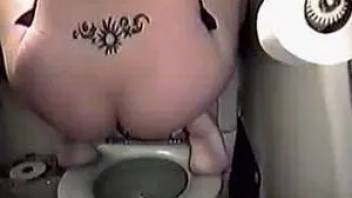 Anya pooping on the toilet