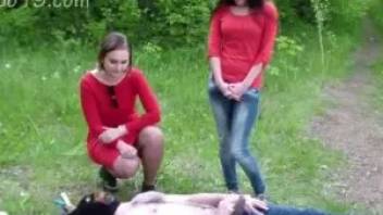 Two Russian girls pooping in the mouth of a guy in the forest
